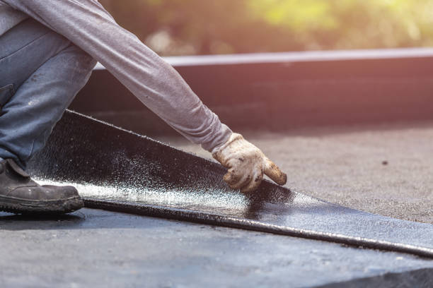 Professional Basement Waterproofing technician working in Wenonah, NJ